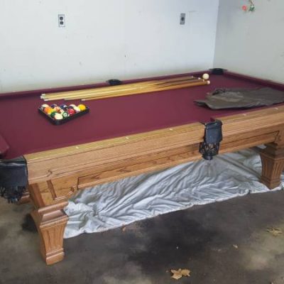 Olhousen 8'x4' pool table, lights, bar, and plenty of cues and accesor